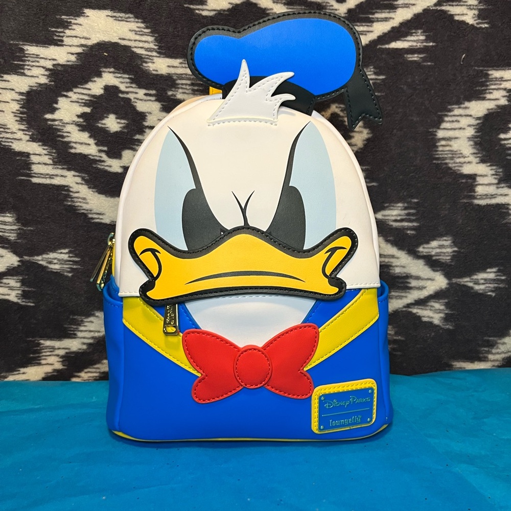 RARE Disney Parks Loungefly Backpack - Donald Duck UV Reactive 90th Anniversary - Picture 1 of 3
